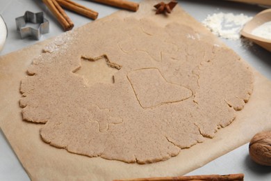 Photo of Homemade Christmas cookies. Raw dough on table, closeup