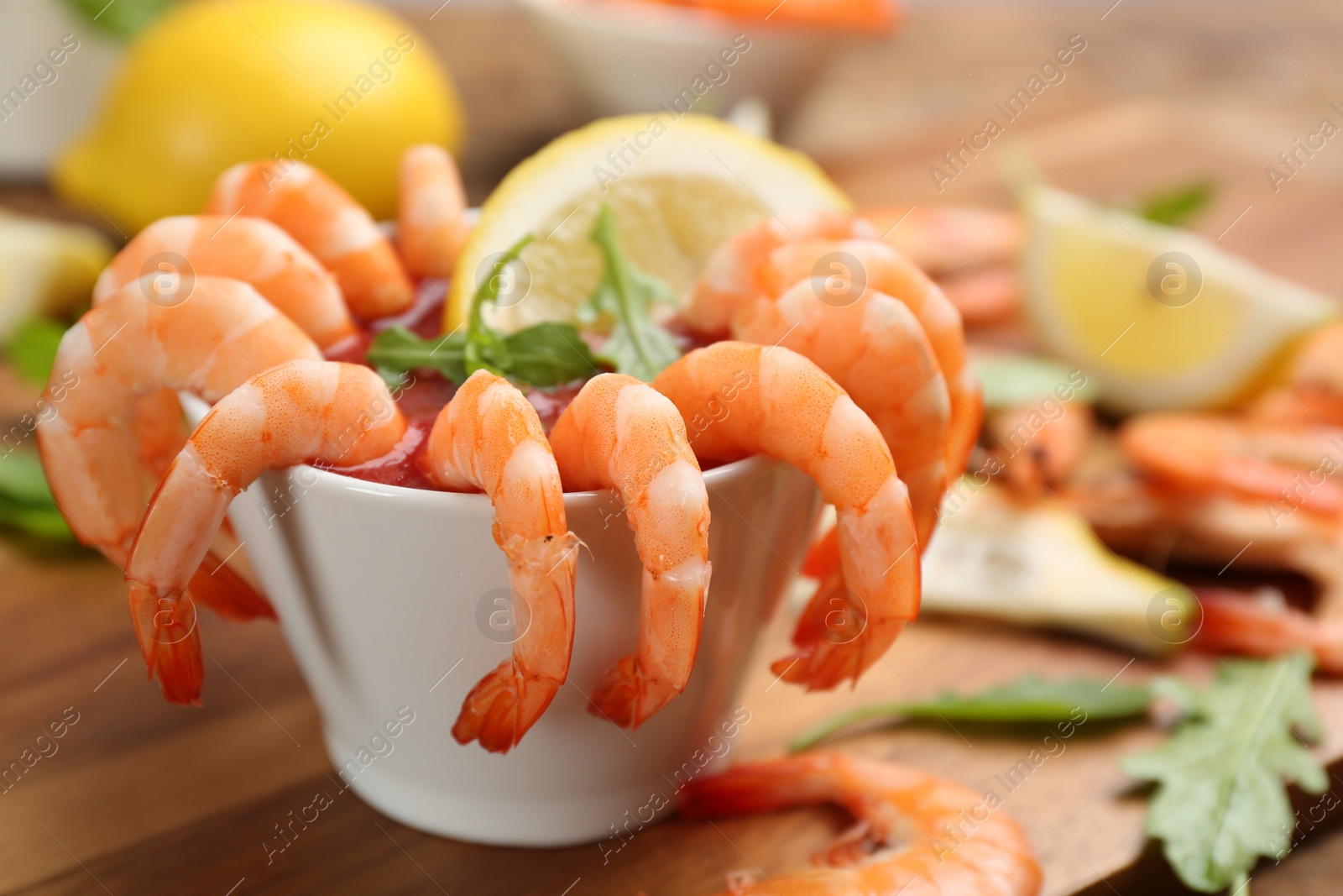 Delicious shrimp cocktail served on board, closeup Photo of Delicious shrimp cocktail served on board, closeup