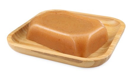 Photo of Delicious sweet quince paste isolated on white