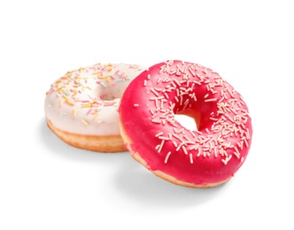 Delicious glazed doughnuts with sprinkles on white background