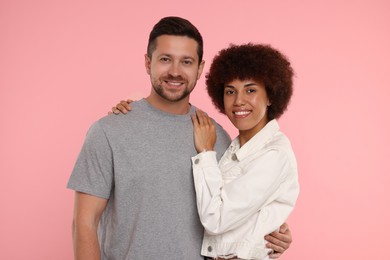 Photo of International dating. Portraitlovely couple on pink background