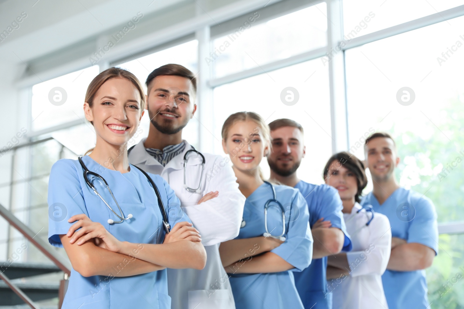 Photo of Team of doctors in uniform at workplace