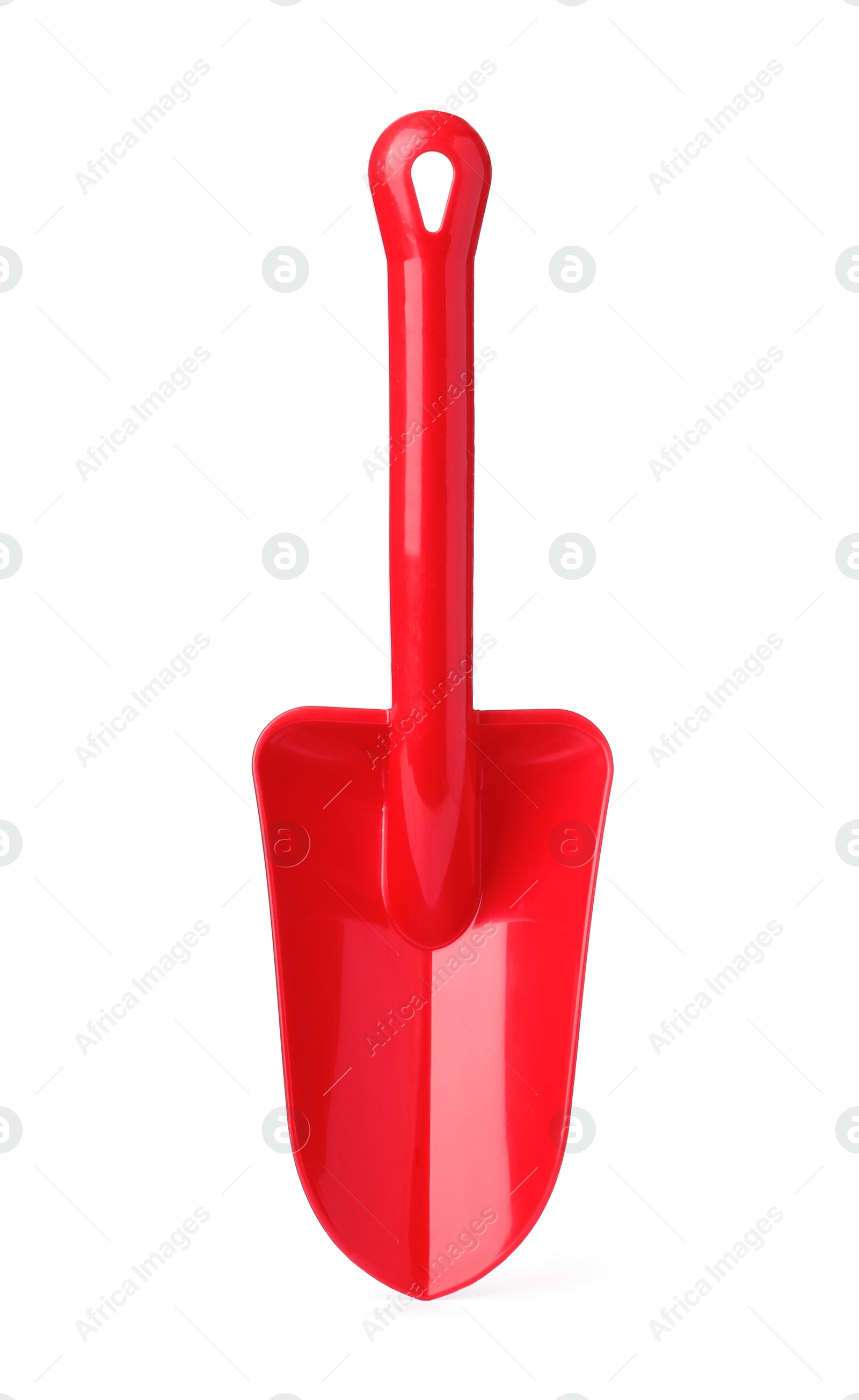 Photo of Red plastic toy shovel isolated on white