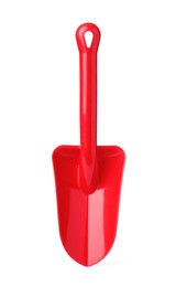 Photo of Red plastic toy shovel isolated on white