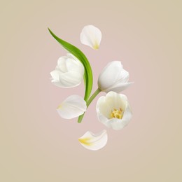 Image of Beautiful white tulips flying on beige background