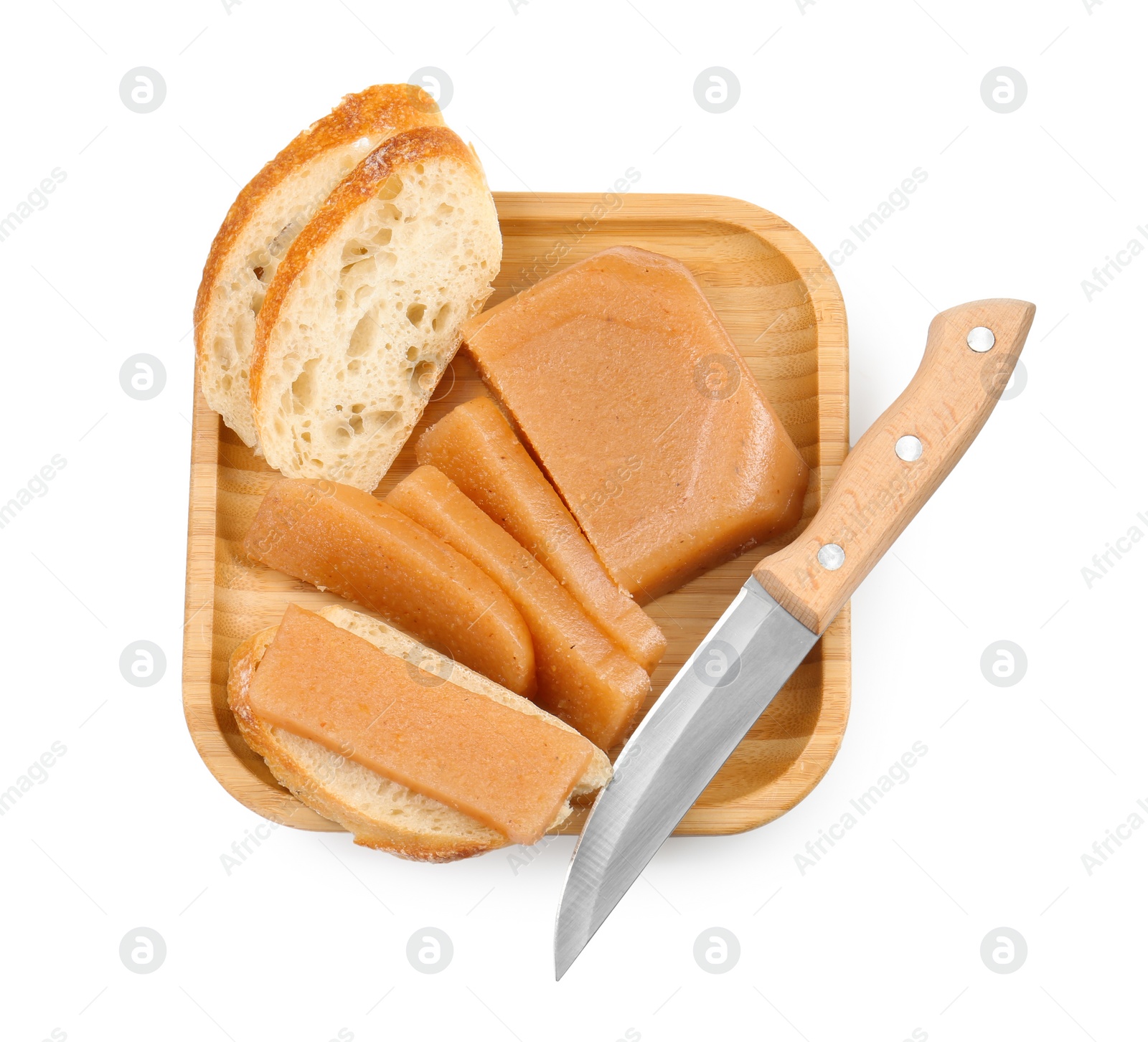 Photo of Delicious sweet quince paste, bread and knife isolated on white, top view
