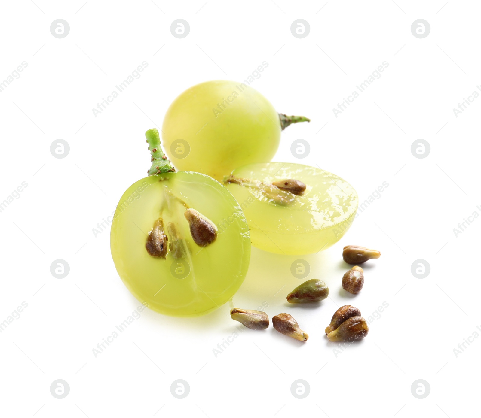 Photo of Cut and whole fresh ripe juicy grapes with seeds on white background