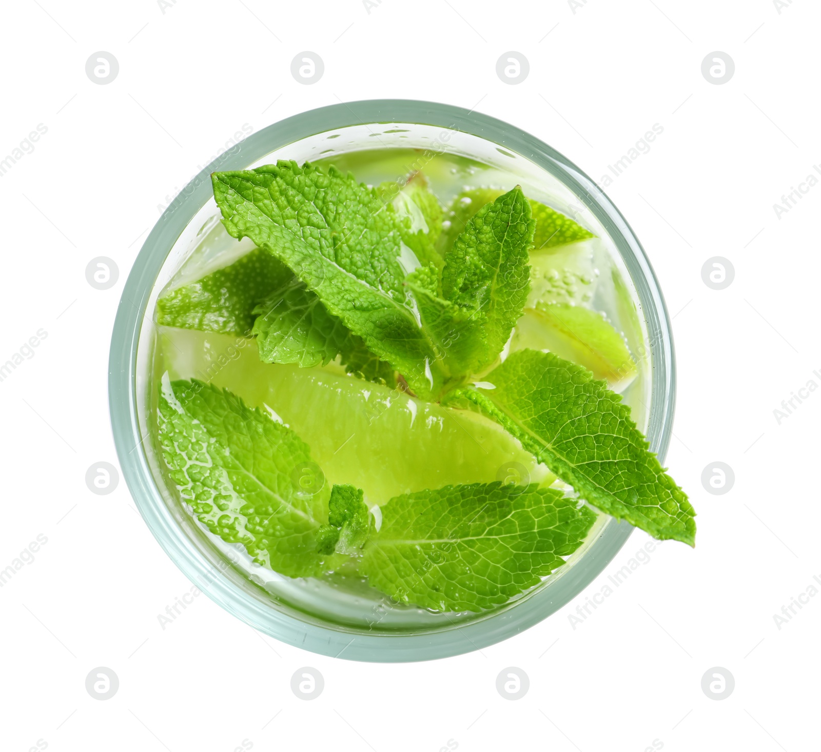 Photo of Refreshing beverage with mint and lime in glass on white background, top view