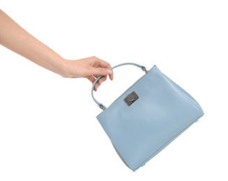 Woman holding stylish handbag on white background, closeup