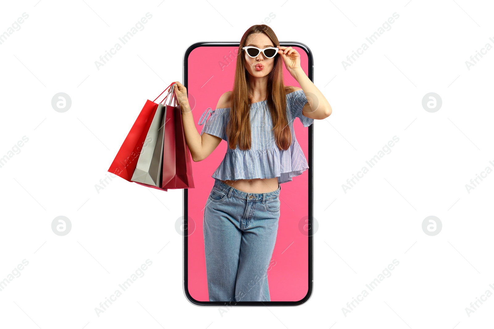 Image of Online shopping. Stylish woman with paper bags looking out from smartphone on white background