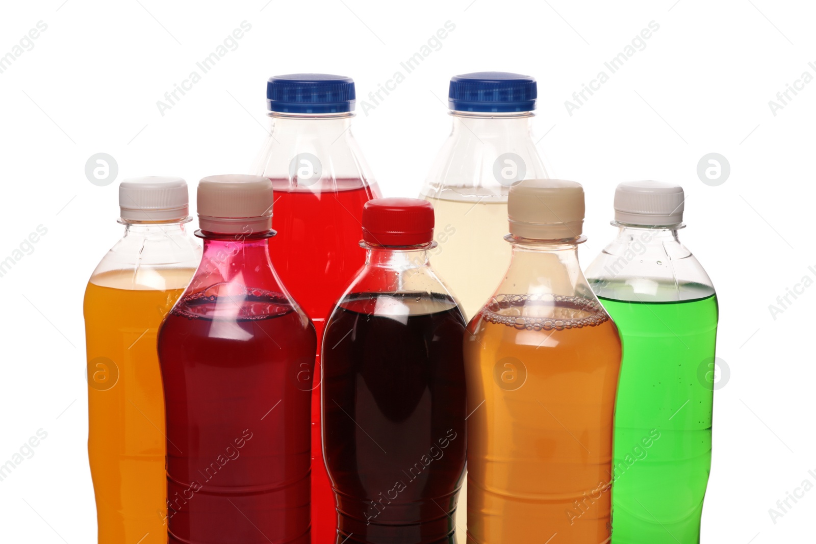 Photo of Bottles of soft drinks on white background, closeup