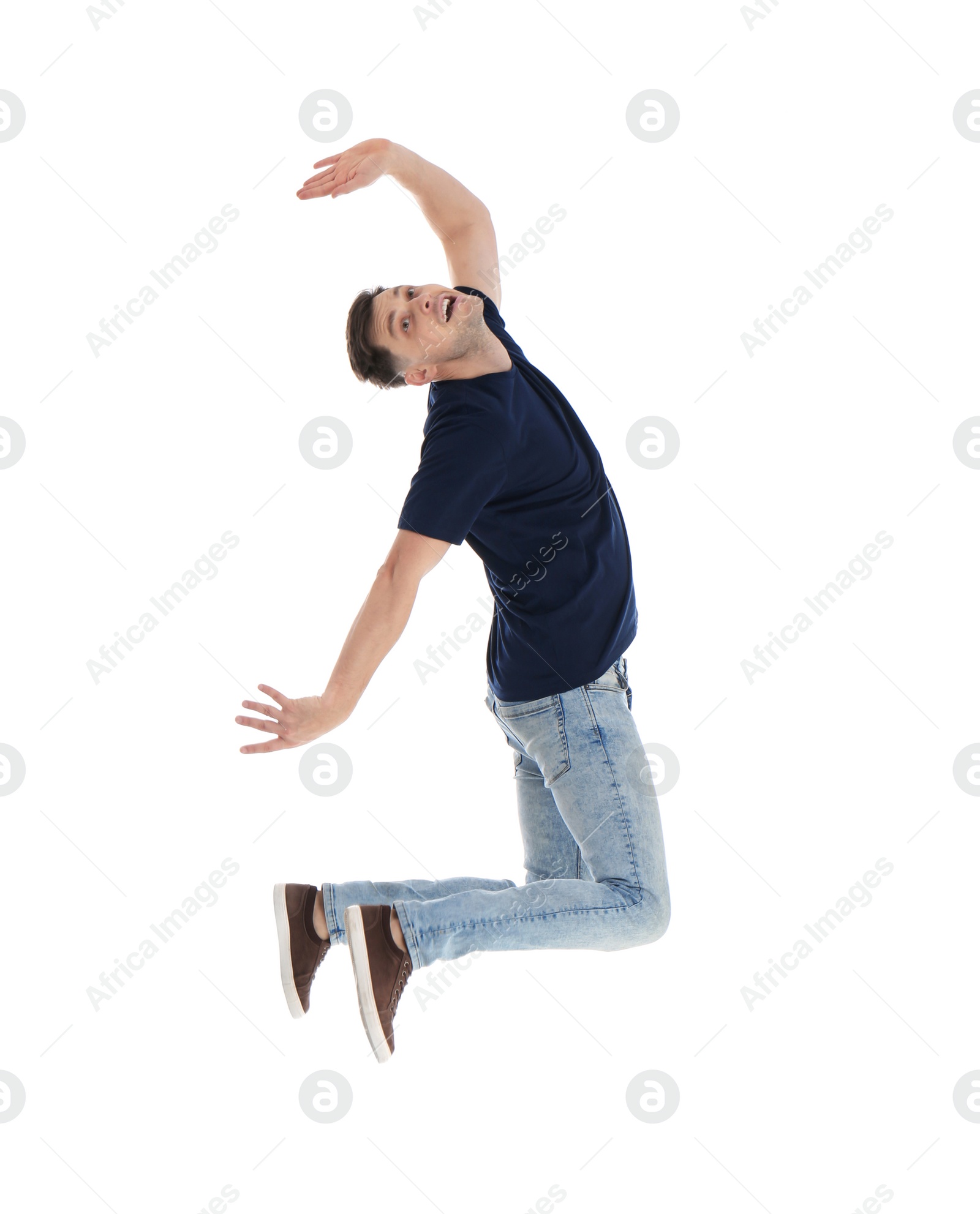 Photo of Man in casual clothes posing on white background