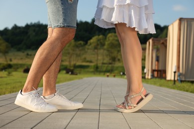 Romantic date. Couple spending time together outdoors, closeup