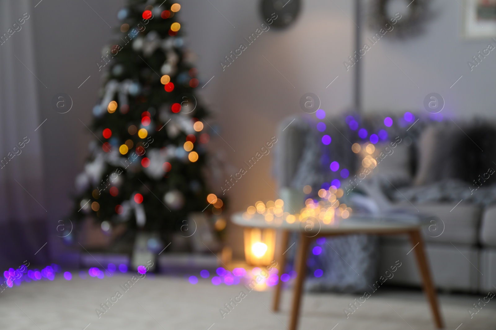 Photo of Blurred view of living room with beautiful Christmas tree