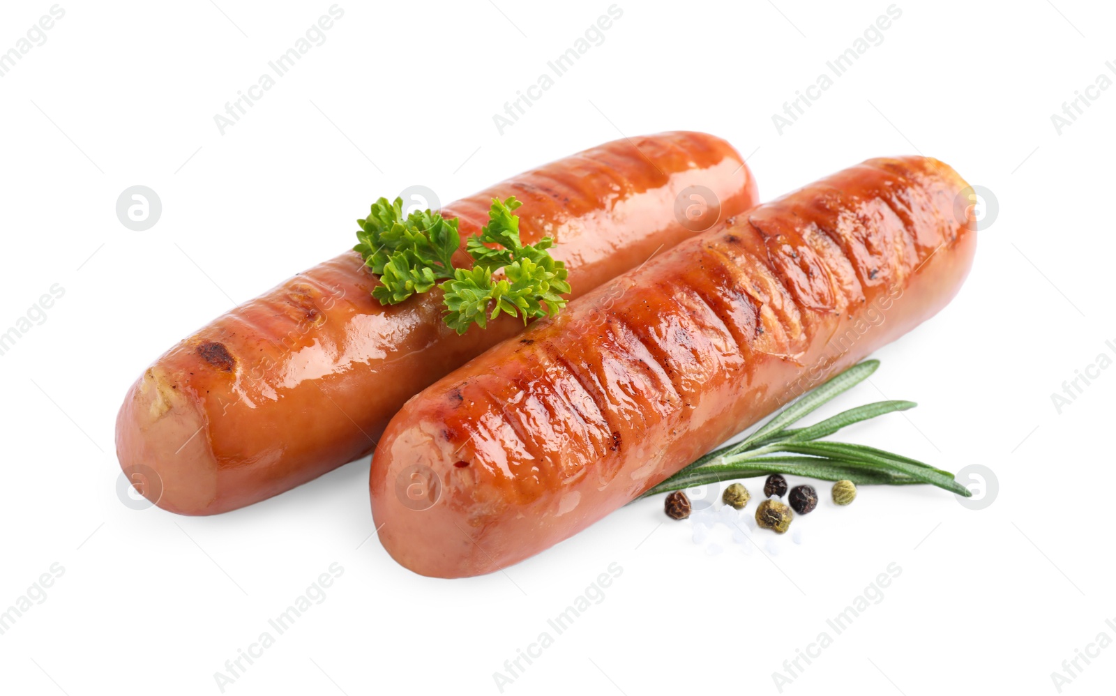 Photo of Delicious grilled sausages on white background. Barbecue food