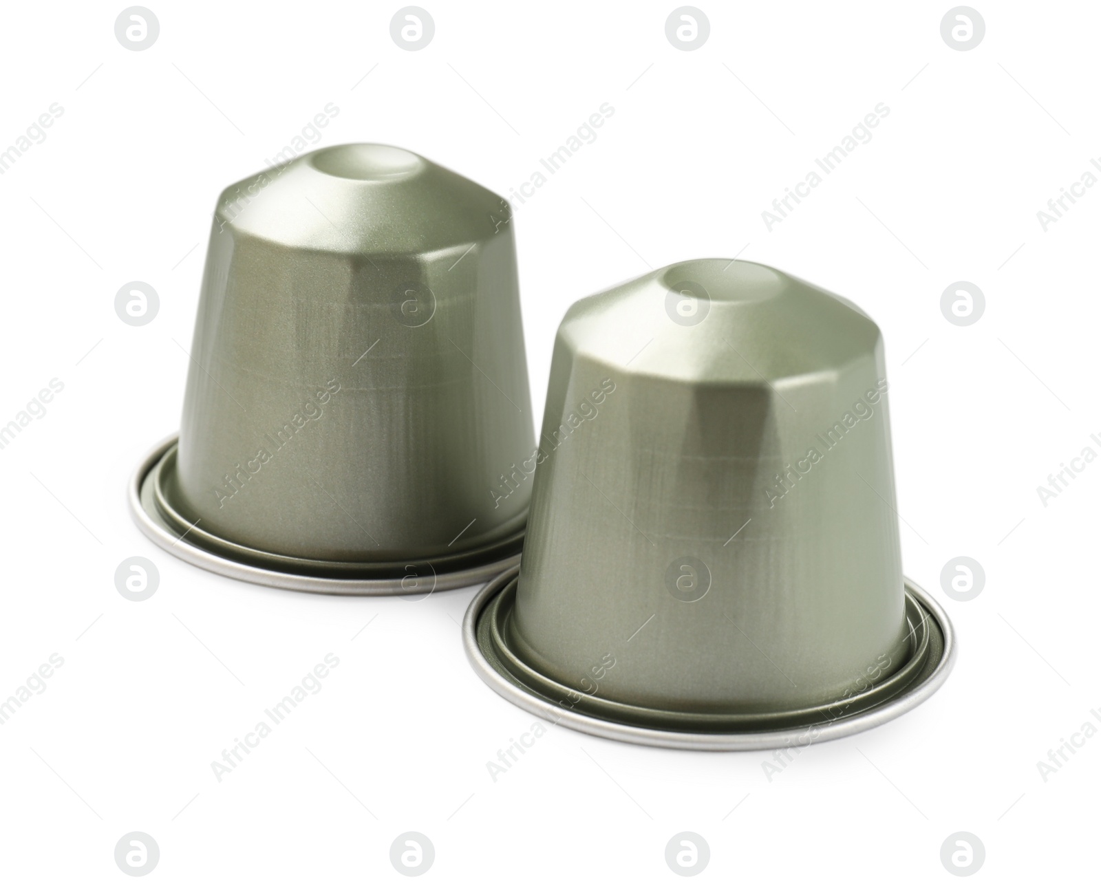 Photo of Two plastic coffee capsules isolated on white