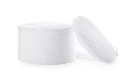Photo of Pile of cotton pads on white background