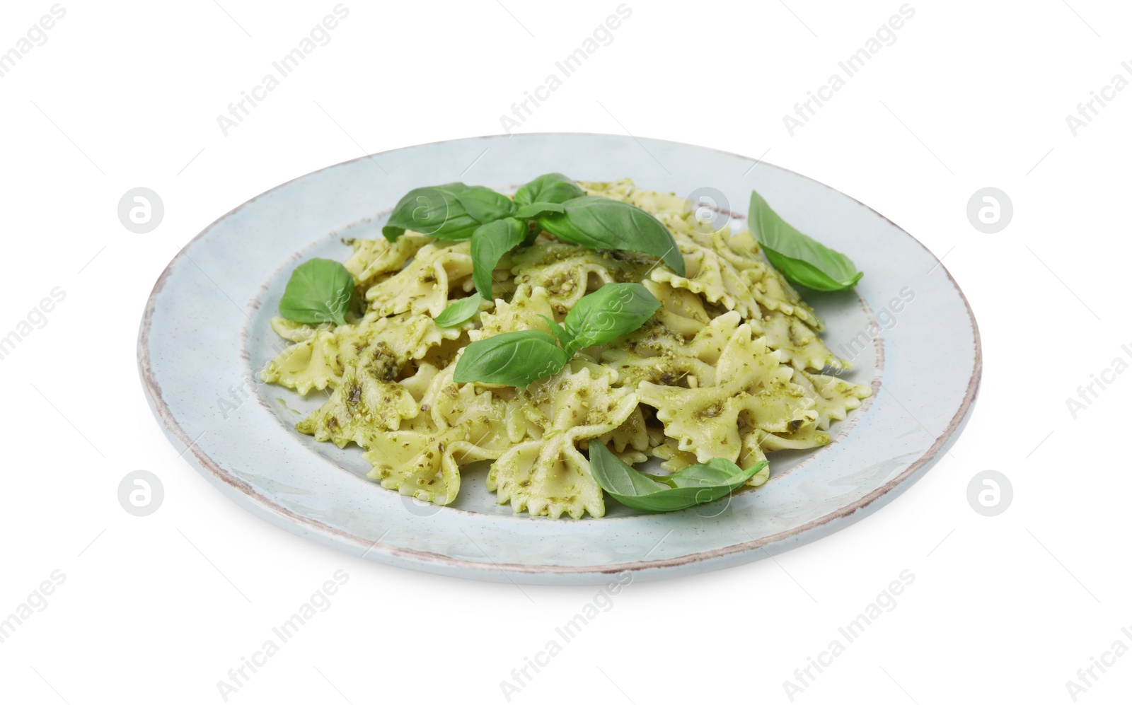 Photo of Delicious pasta with pesto sauce and basil isolated on white