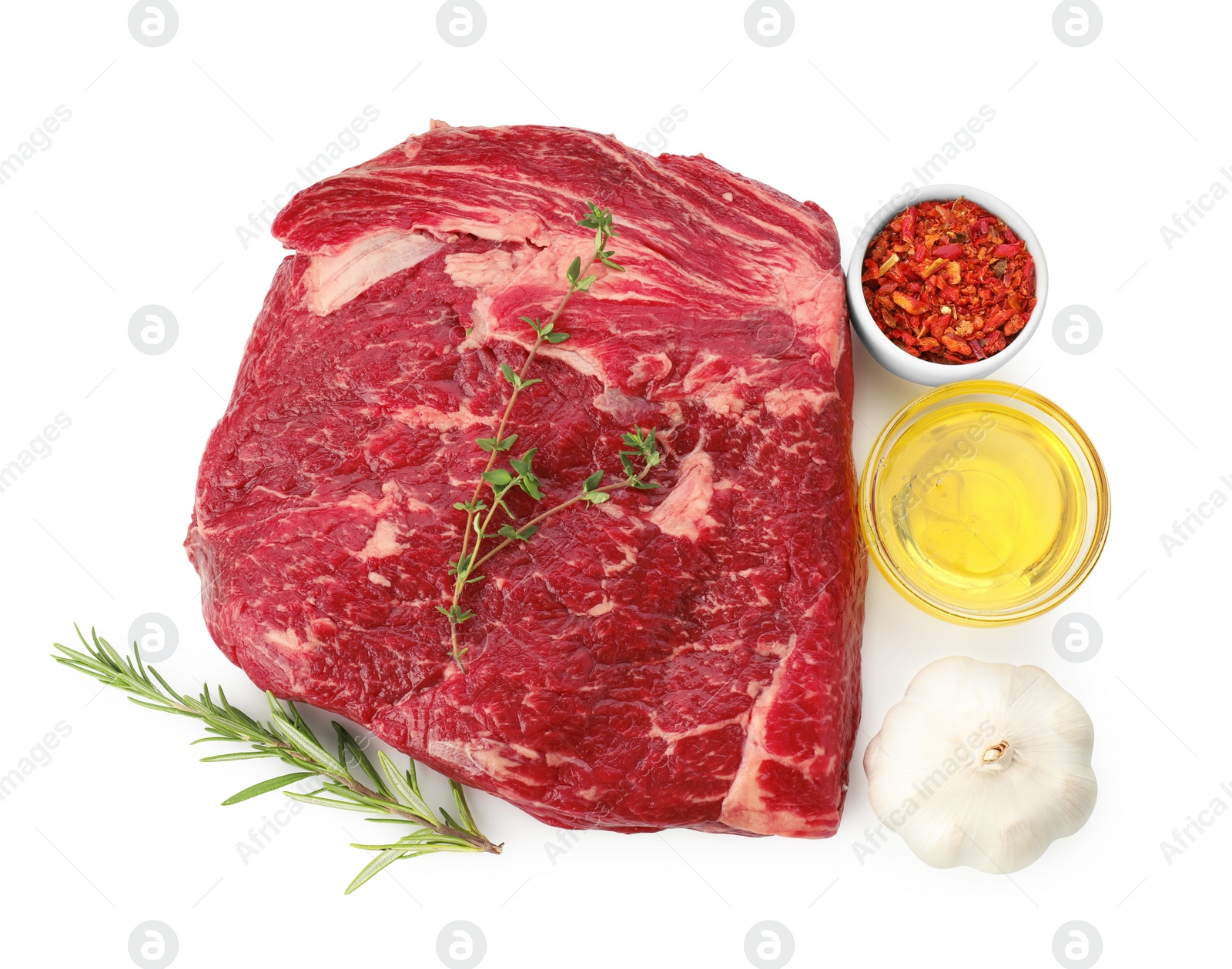 Photo of Fresh raw beef cut and products isolated on white, top view