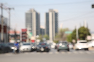 San Pedro Garza Garcia, Mexico – March 20, 2023: Blurred view of road with cars and buildings, bokeh effect