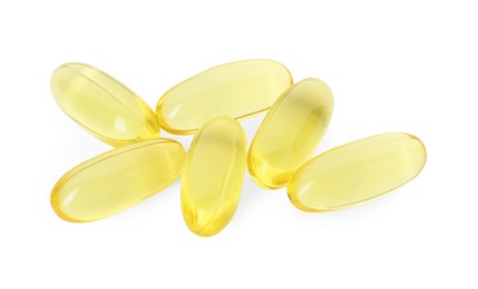 Photo of Vitamin capsules isolated on white. Health supplement