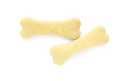 Bone shaped dog cookies on white background, top view