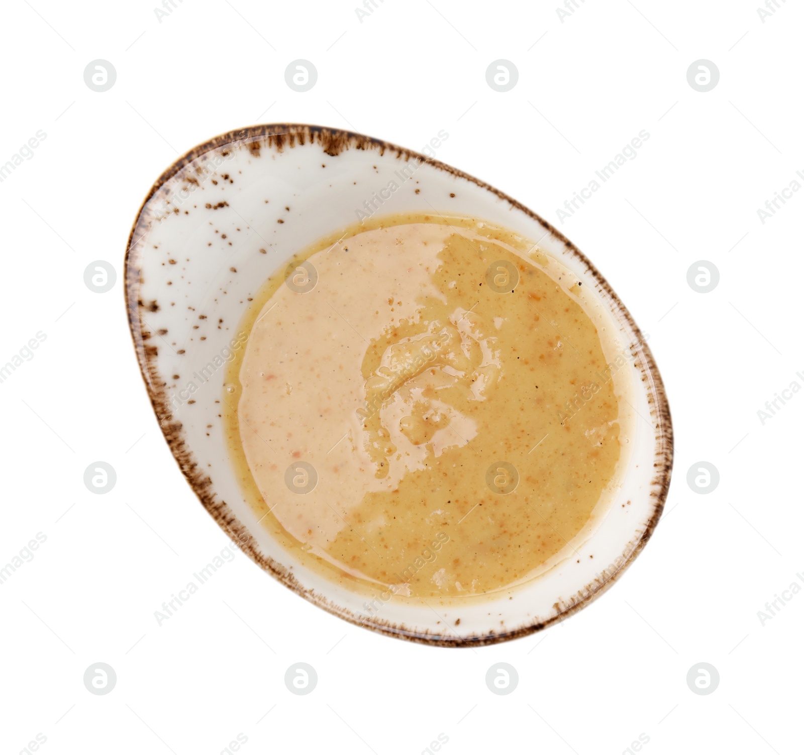 Photo of Delicious turkey gravy in sauce boat isolated on white, top view