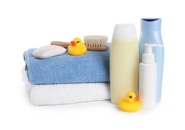 Photo of Baby cosmetic products, bath ducks, brush and towels isolated on white