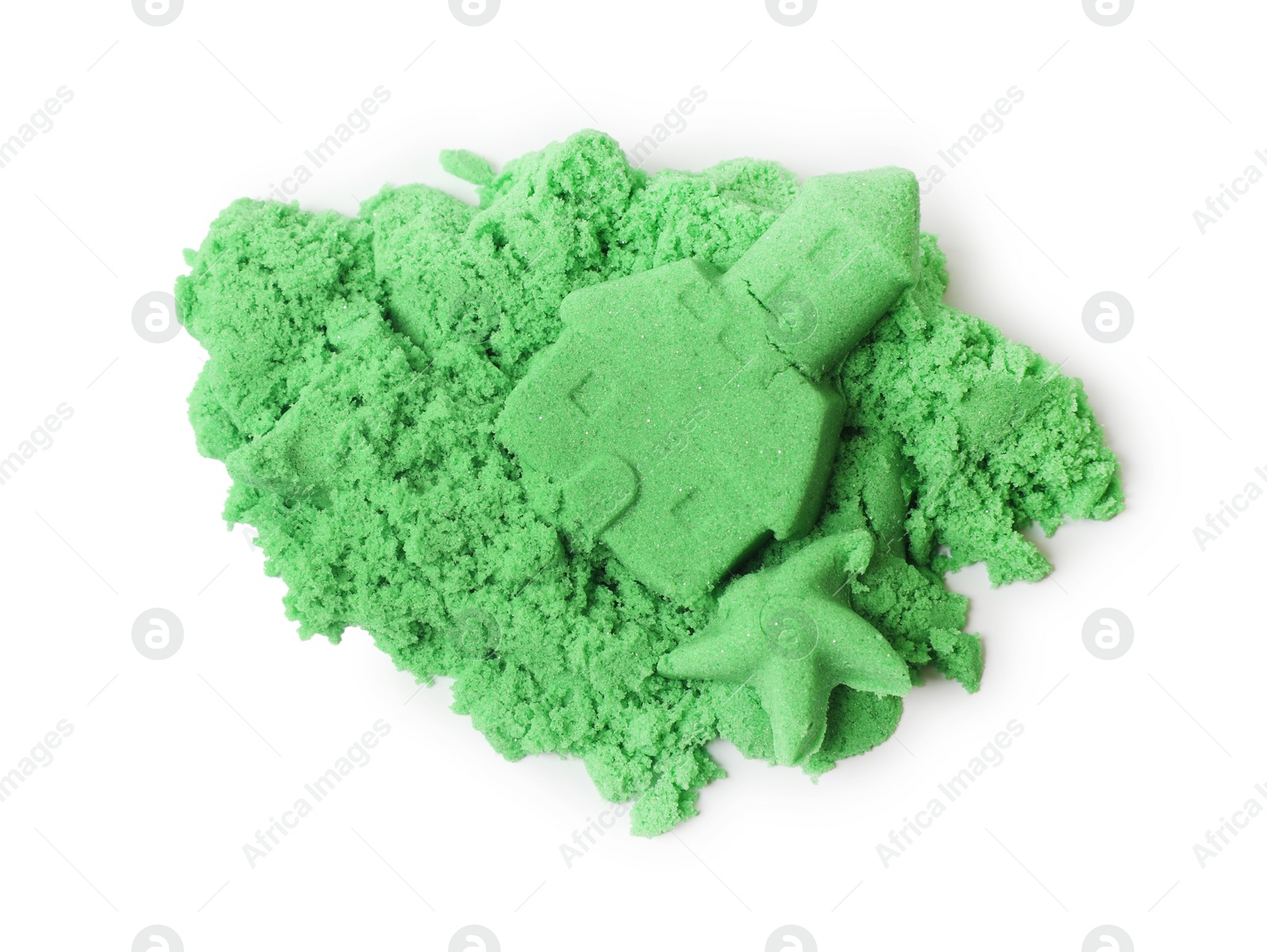 Photo of Castle and starfish made of green kinetic sand isolated on white, top view