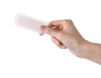 Photo of Woman holding medical adhesive bandage isolated on white, closeup