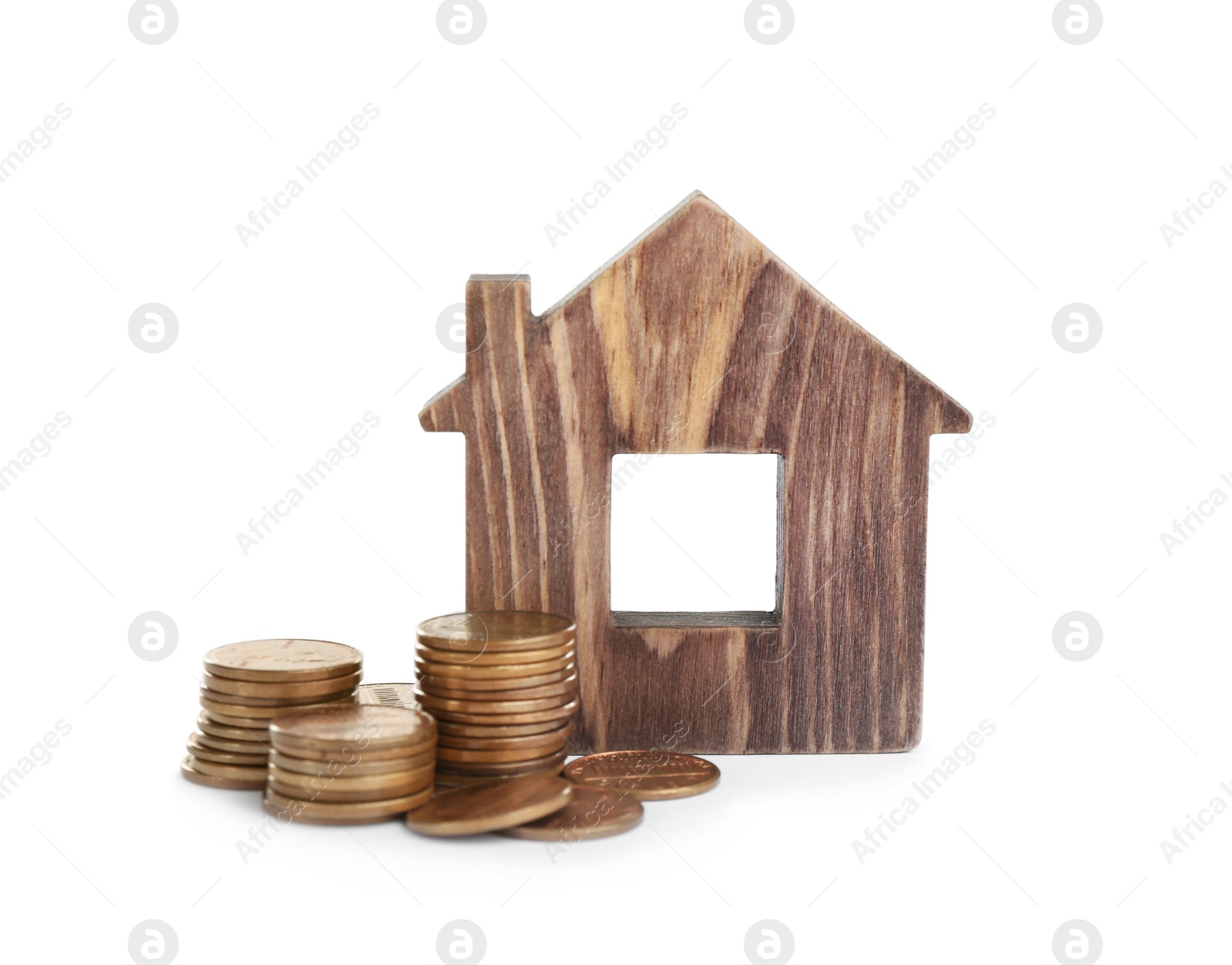 Photo of House model and coins isolated on white