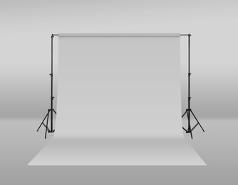 Image of Modern light grey photo background. Professional studio equipment