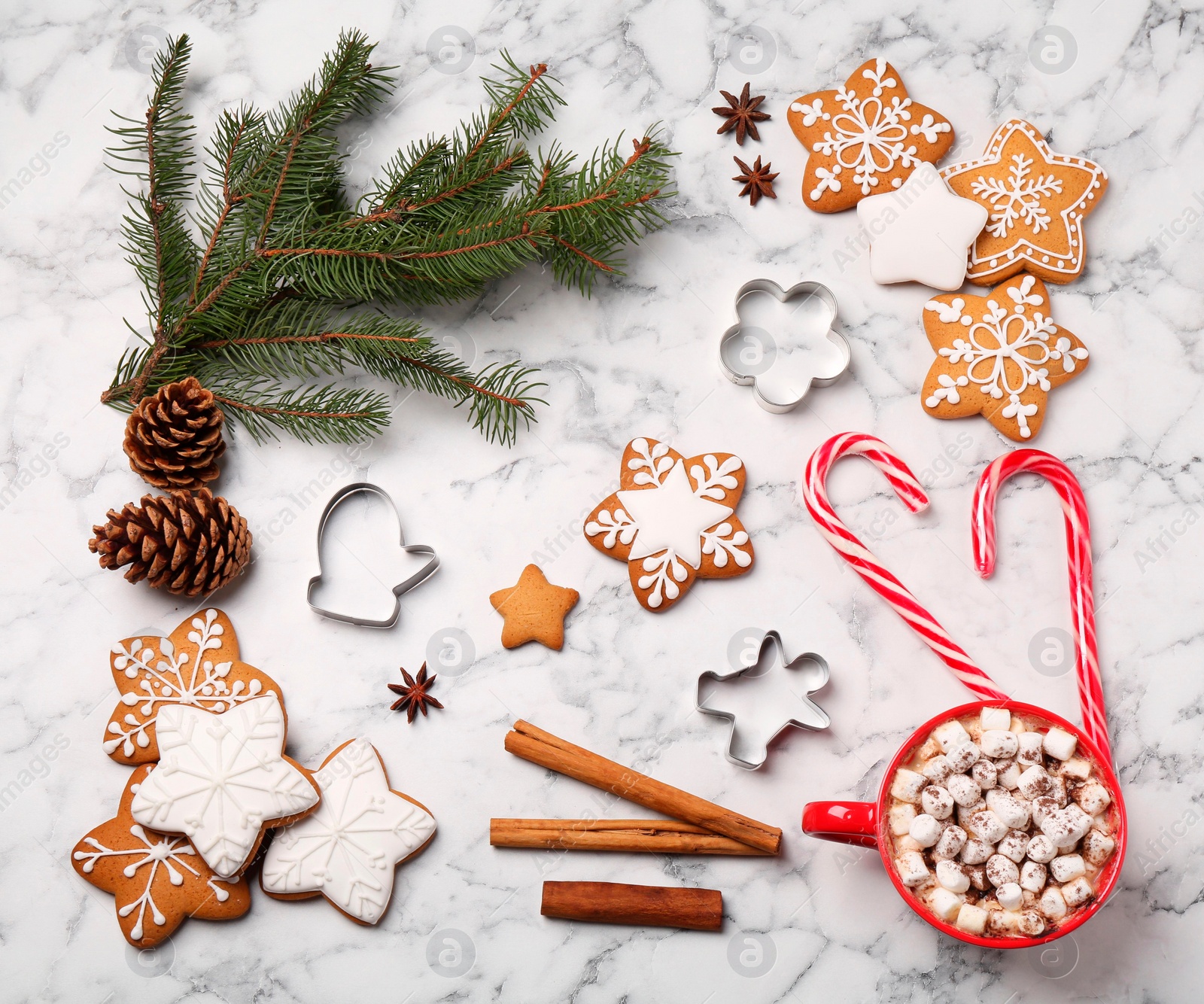 Photo of Flat lay composition with decorated Christmas cookies on white marble table