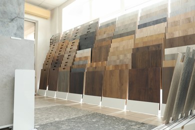 Assortment of tiles in store. Many different samples indoors