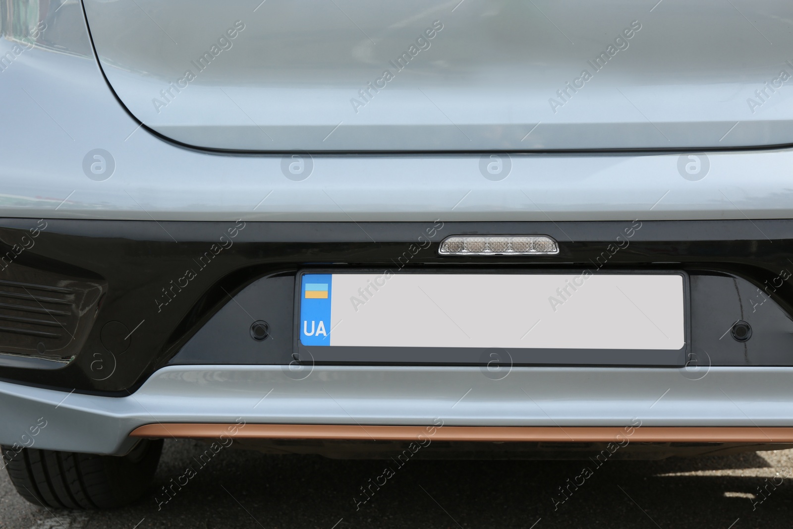 Photo of Car with vehicle registration plate outdoors, closeup