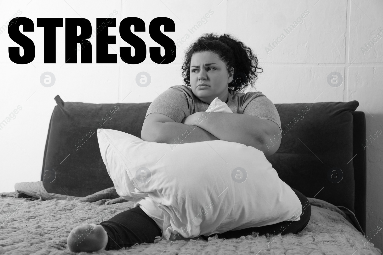 Image of Overweight woman suffering from depression at home and word STRESS