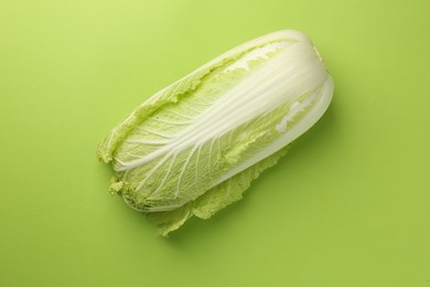 Fresh ripe Chinese cabbage on light green background, top view