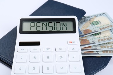 Image of Calculator with word Pension, dollar banknotes and wallet on white background