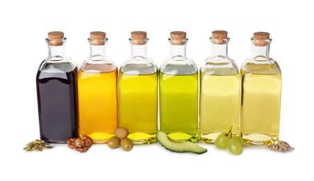 Vegetable fats. Bottles of different cooking oils and ingredients isolated on white