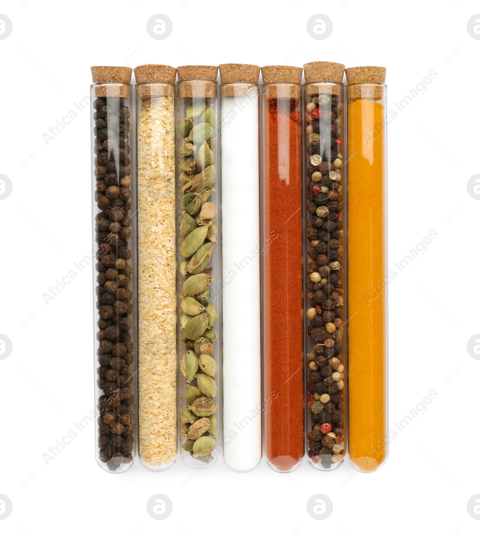 Photo of Glass tubes with different spices on white background, top view