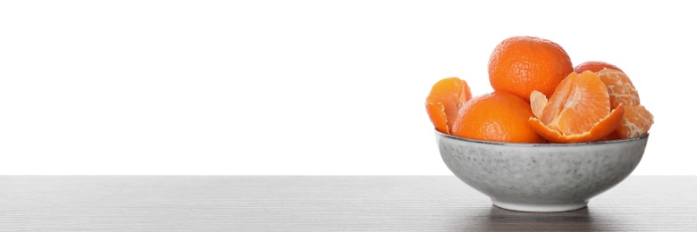 Photo of Delicious fresh tangerines on table against white background. Space for text