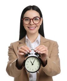 Photo of Businesswoman holding alarm clock on white background. Time management