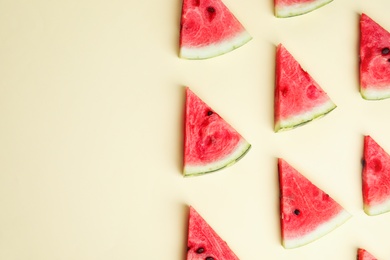 Photo of Slices of ripe watermelon on beige background, flat lay. Space for text