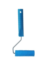 Photo of Roller brush with blue paint on white background