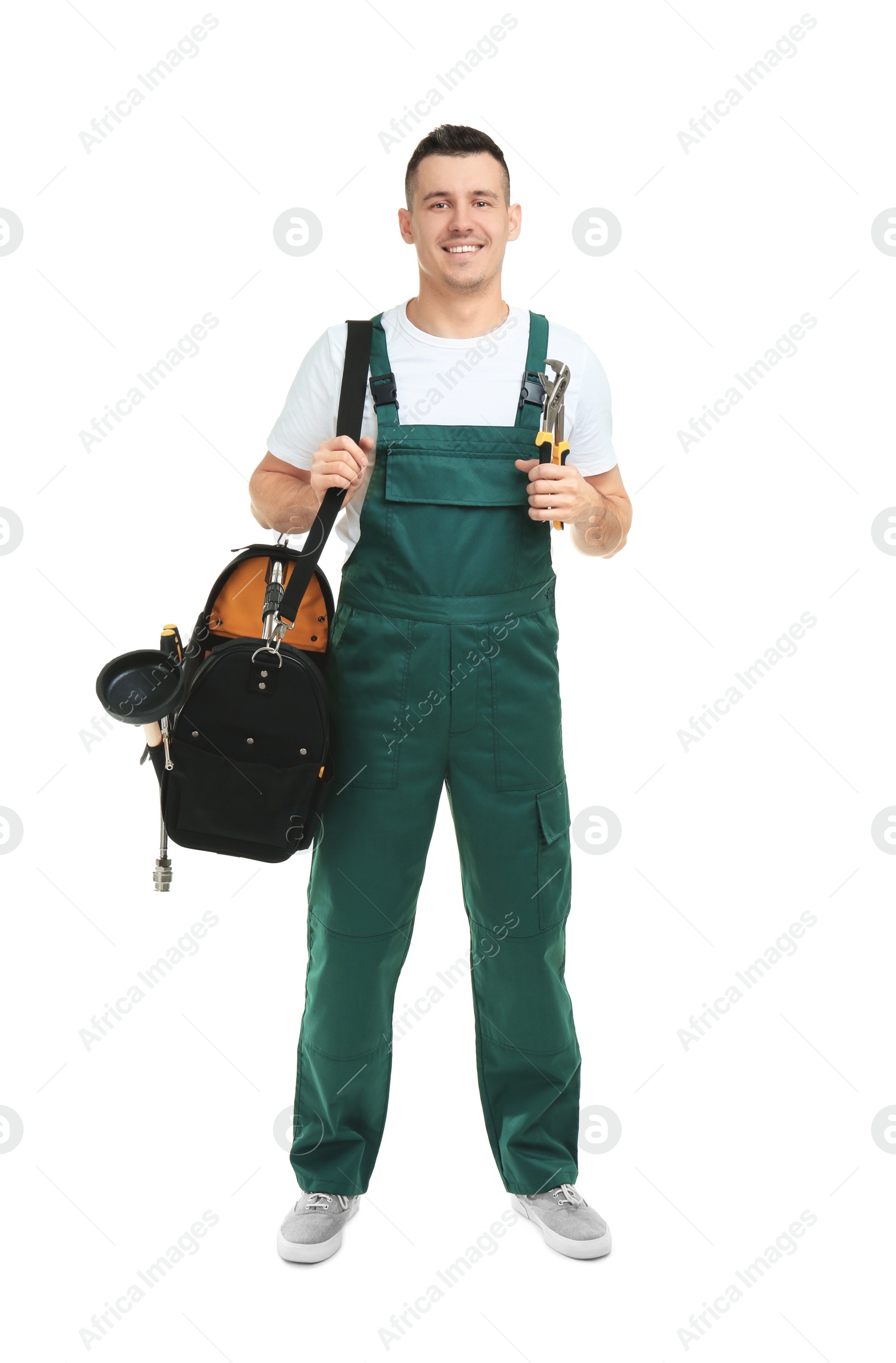 Photo of Young plumber with tool bag on white background