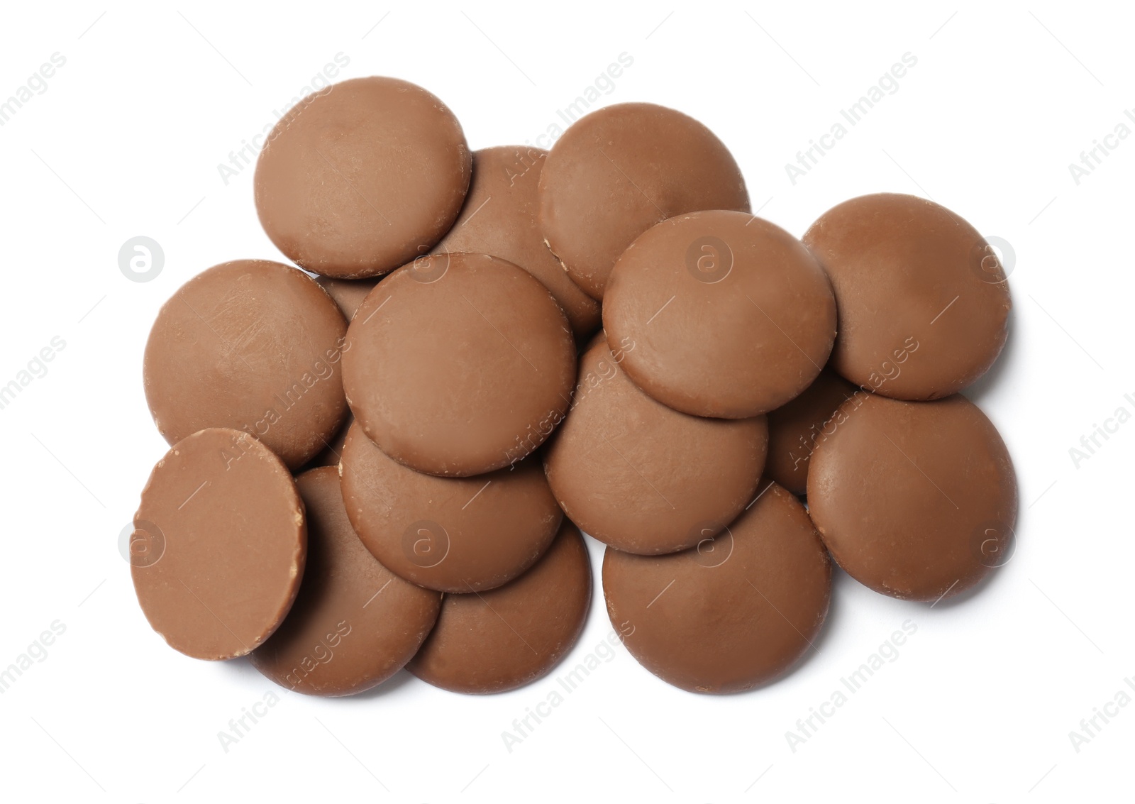 Photo of Delicious milk chocolate chips on white background