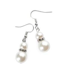 Photo of Elegant pearl earrings on white background, top view