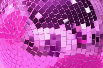 Photo of One shiny disco ball as background, closeup