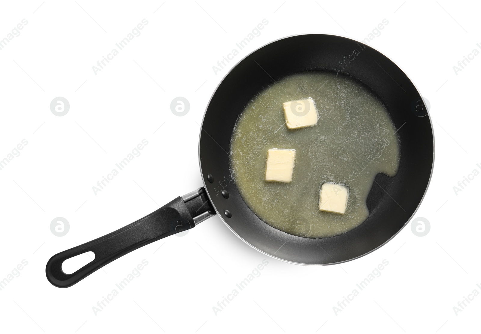 Photo of Melting butter in frying pan on white background, top view