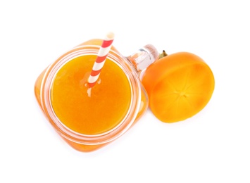 Photo of Tasty persimmon smoothie with straw and fresh fruit isolated on white, top view